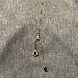 Swarovski rose gold horse shoe evil eye and tear drop necklace